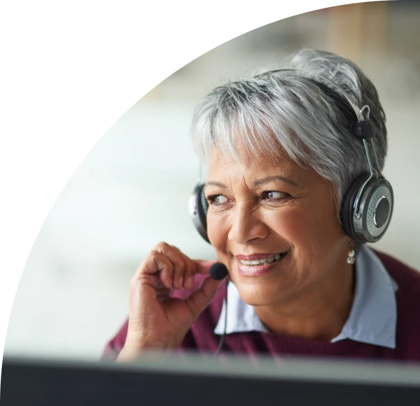 Customer service representative wearing headset with microphone
